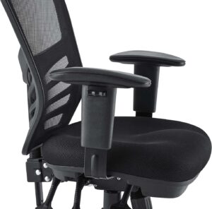 A detailed close-up shot of a black ergonomic office chair, showcasing the thick fabric mesh seat cushion, breathable mesh backrest with stylized cutouts, and the T-shaped adjustable height armrests featuring a side-control button.